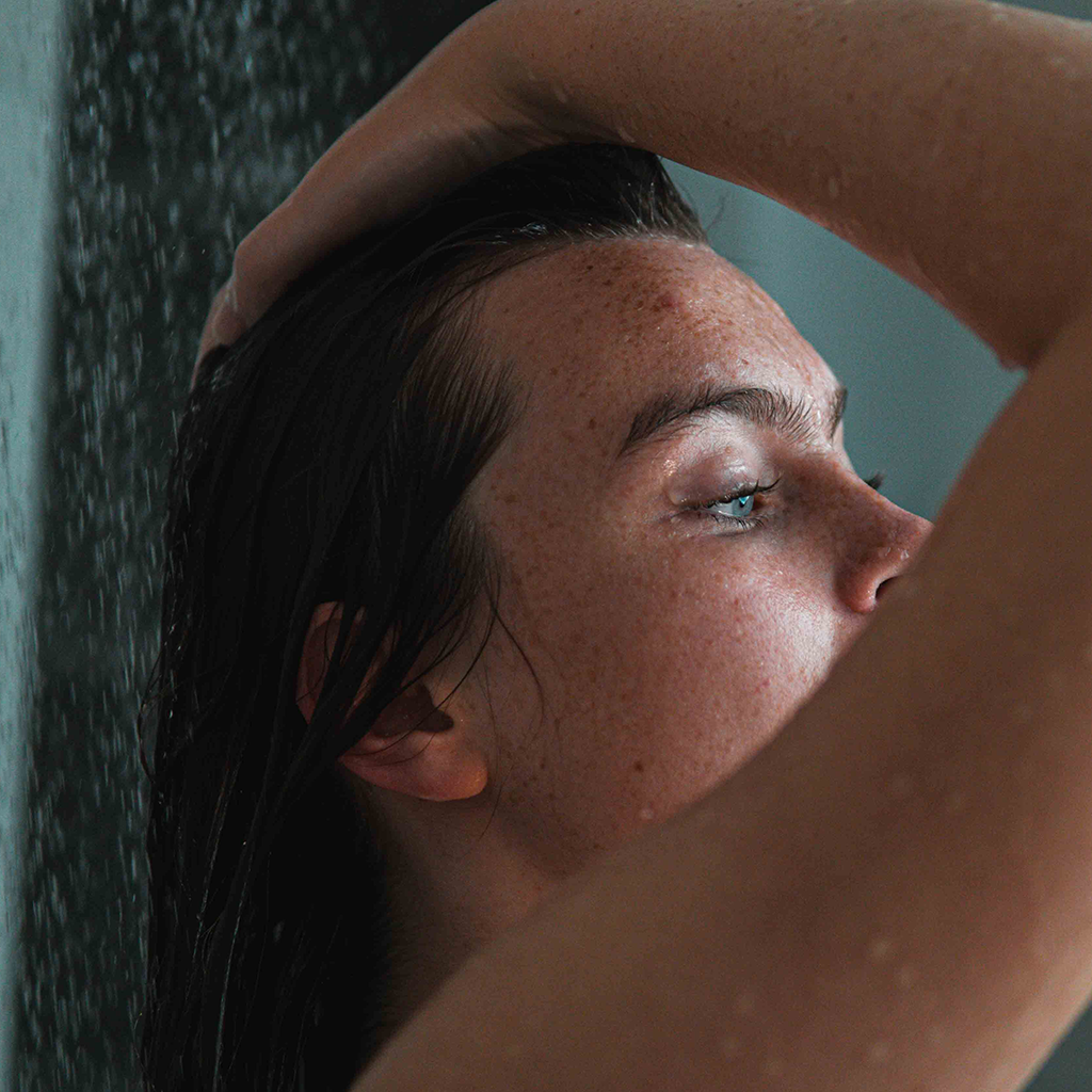 Chamomile Down & Carry On Shampoo Bar (70 grams) woman washes hair